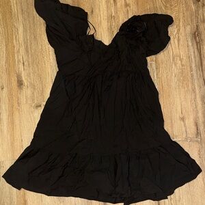 Elegant Black Dress with Ruffle Details